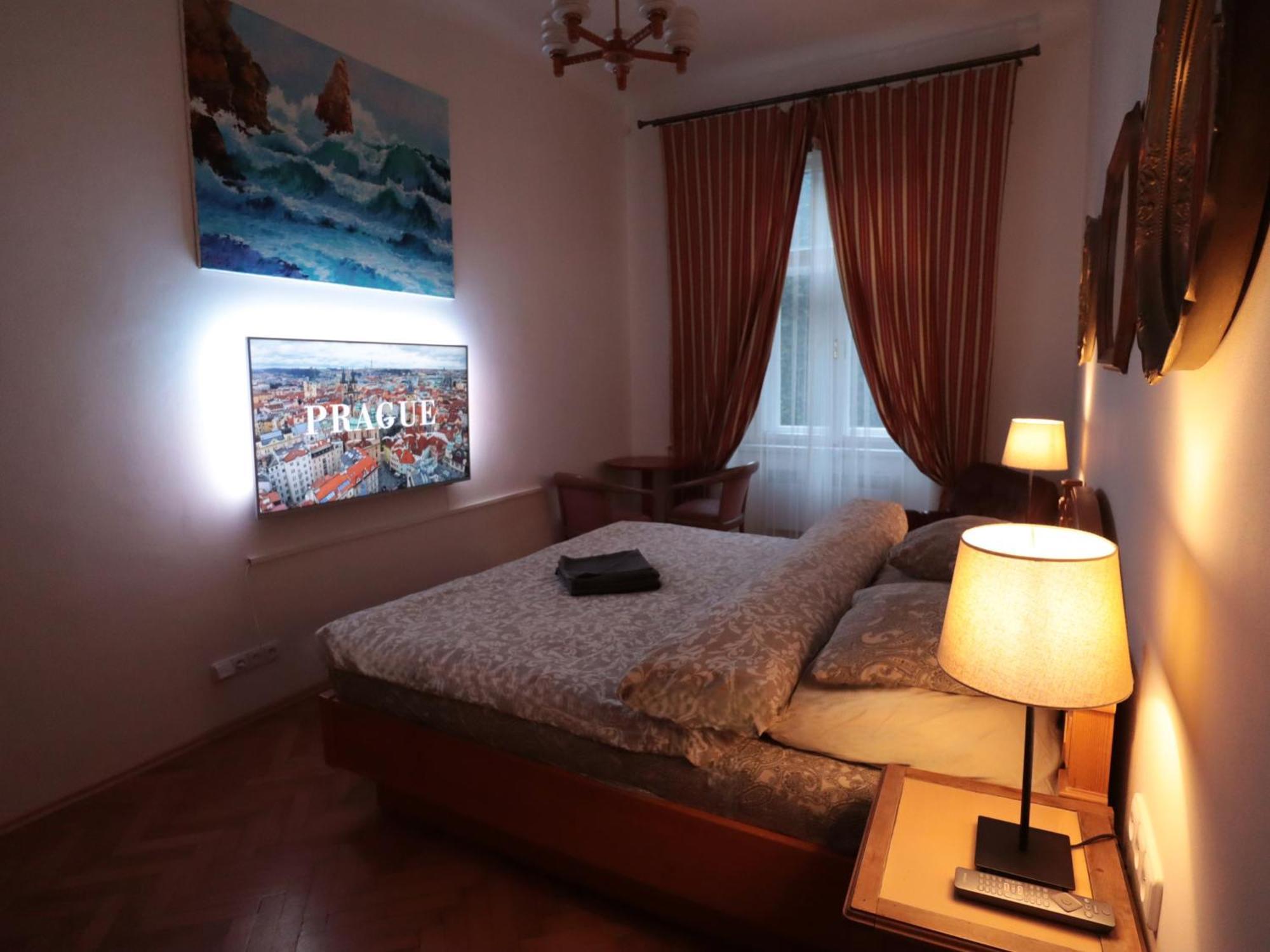 Quarto em Acomodações Particulares & Parking Assistance